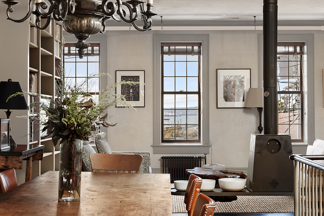 164 Coffey Street Brooklyn, NY 11231 - Photo 3 of 31 a living room with furniture a chandelier and a window