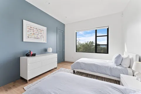 a room with a bed and a window