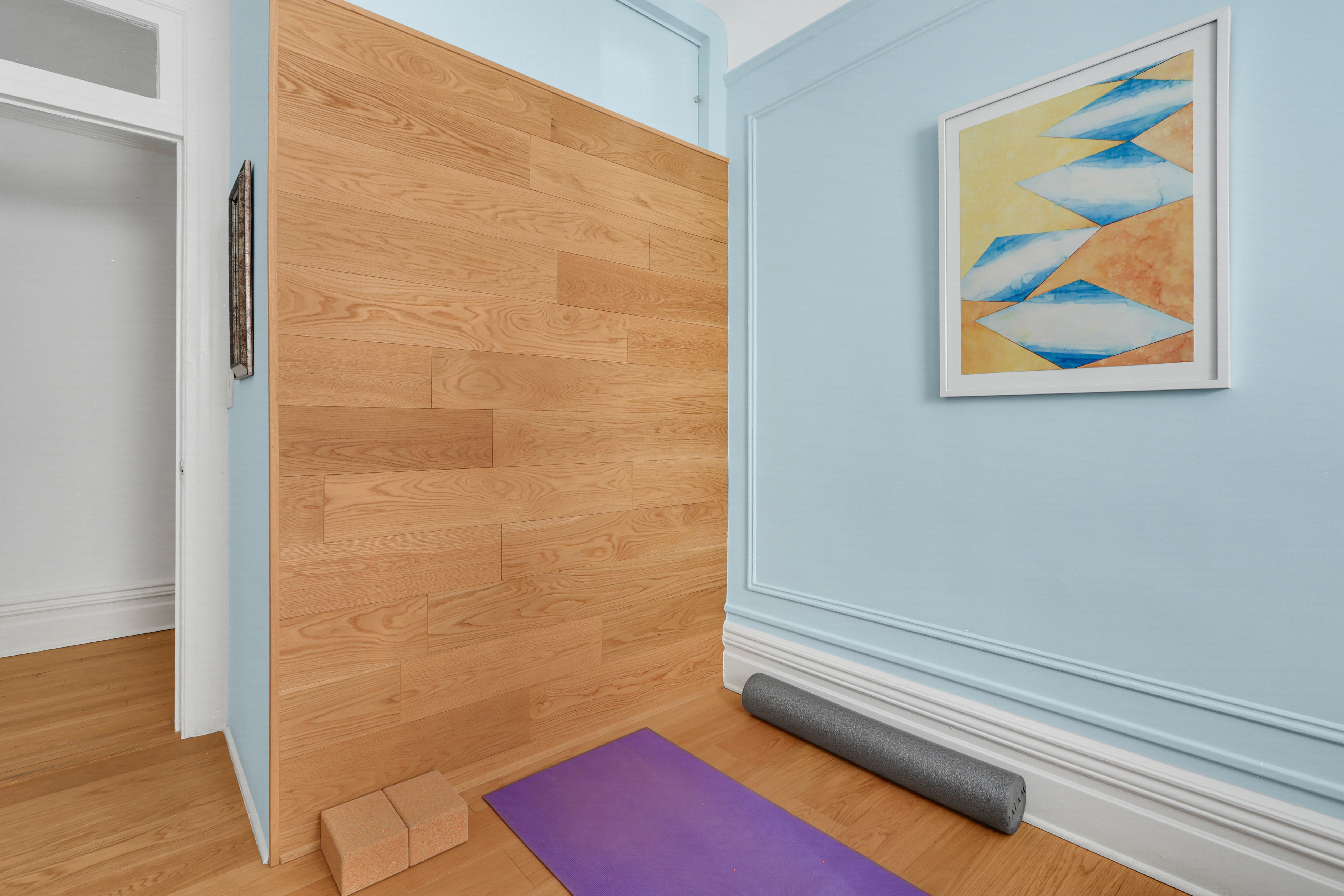 311 West 97th Street, Unit 6E Manhattan, NY 10025 - Photo 15 of 18 a bathroom with a painting on the wall and a shower