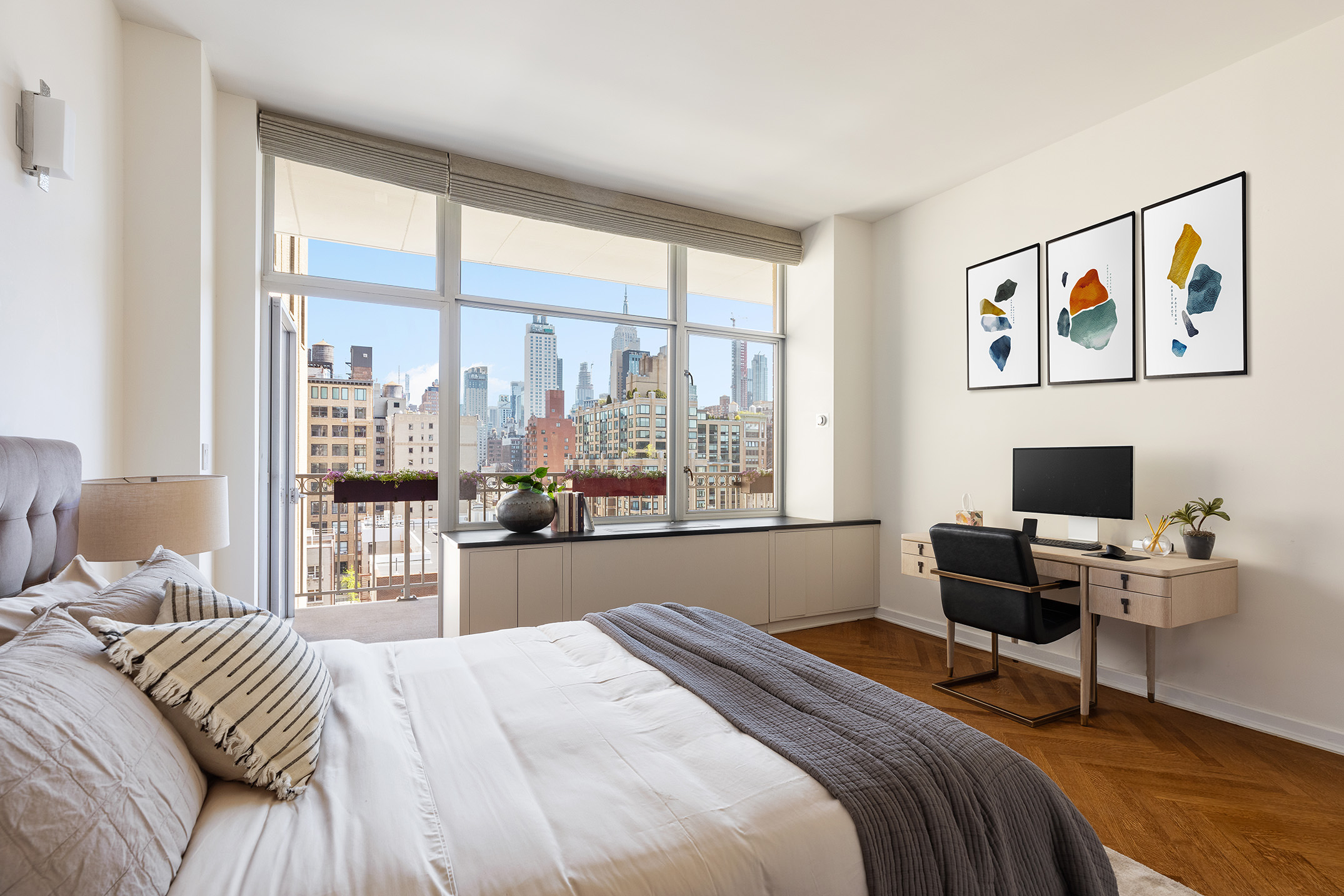 201 West 17th Street, Unit PHF Manhattan, NY 10011 - Photo 11 of 22 a bedroom with a bed and a desk