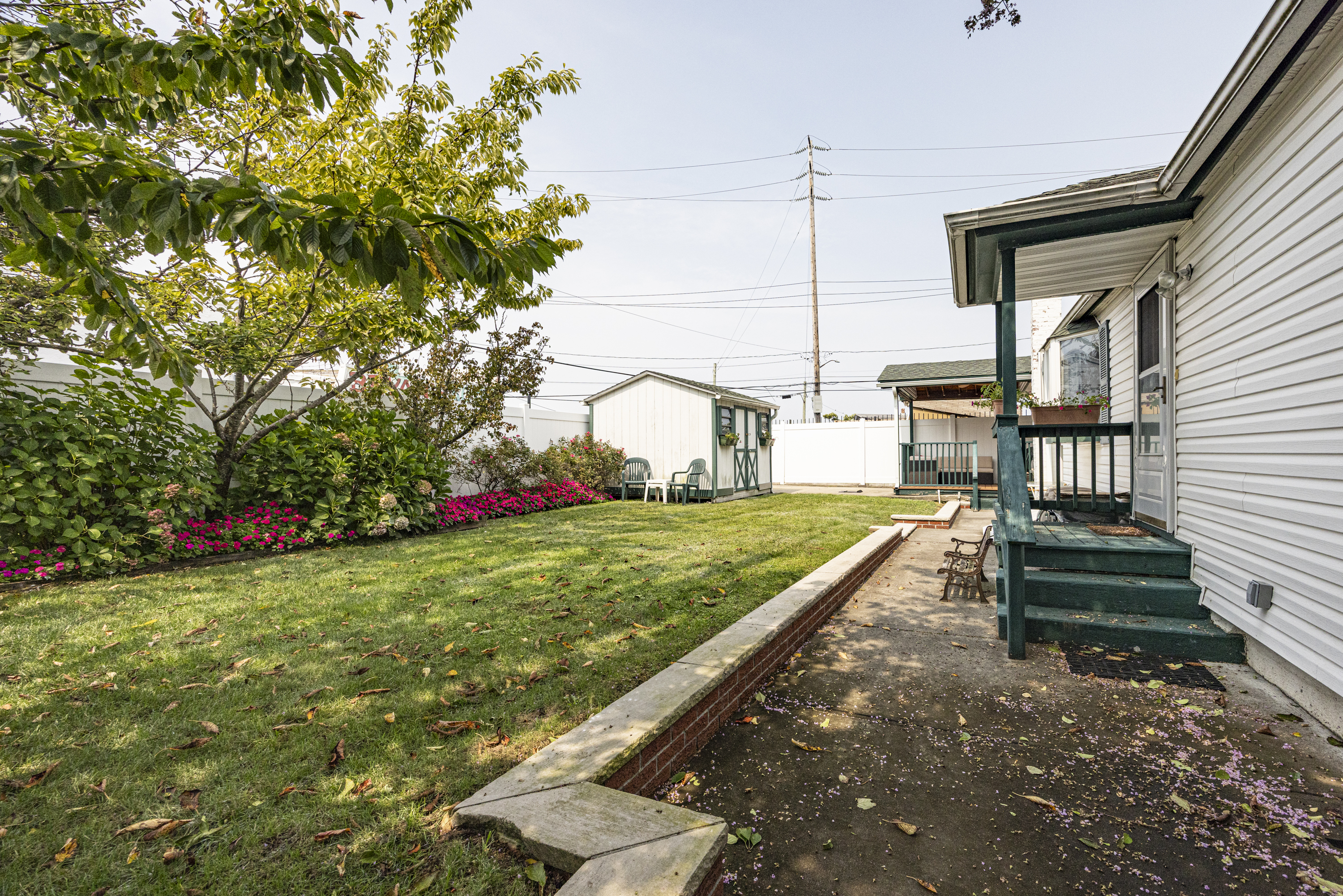355 D Dormans Court Queens, NY 11693 - Photo 15 of 21 a view of a house with a backyard