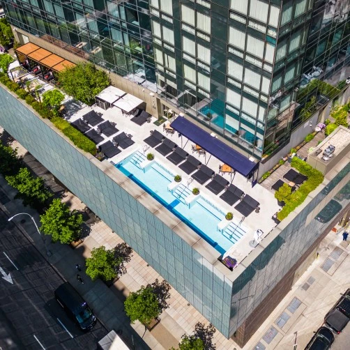246 Spring Street, Unit 3503 Manhattan, NY 10013 - Photo 11 of 13 a view of balcony with a couple of flower plants
