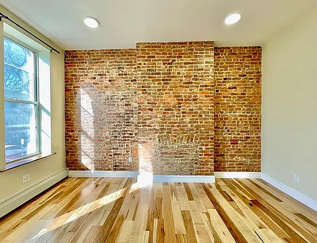1120 Greene Avenue, Unit 1 Brooklyn, NY 11221 - Photo 7 of 13 a view of wooden floor with a balcony