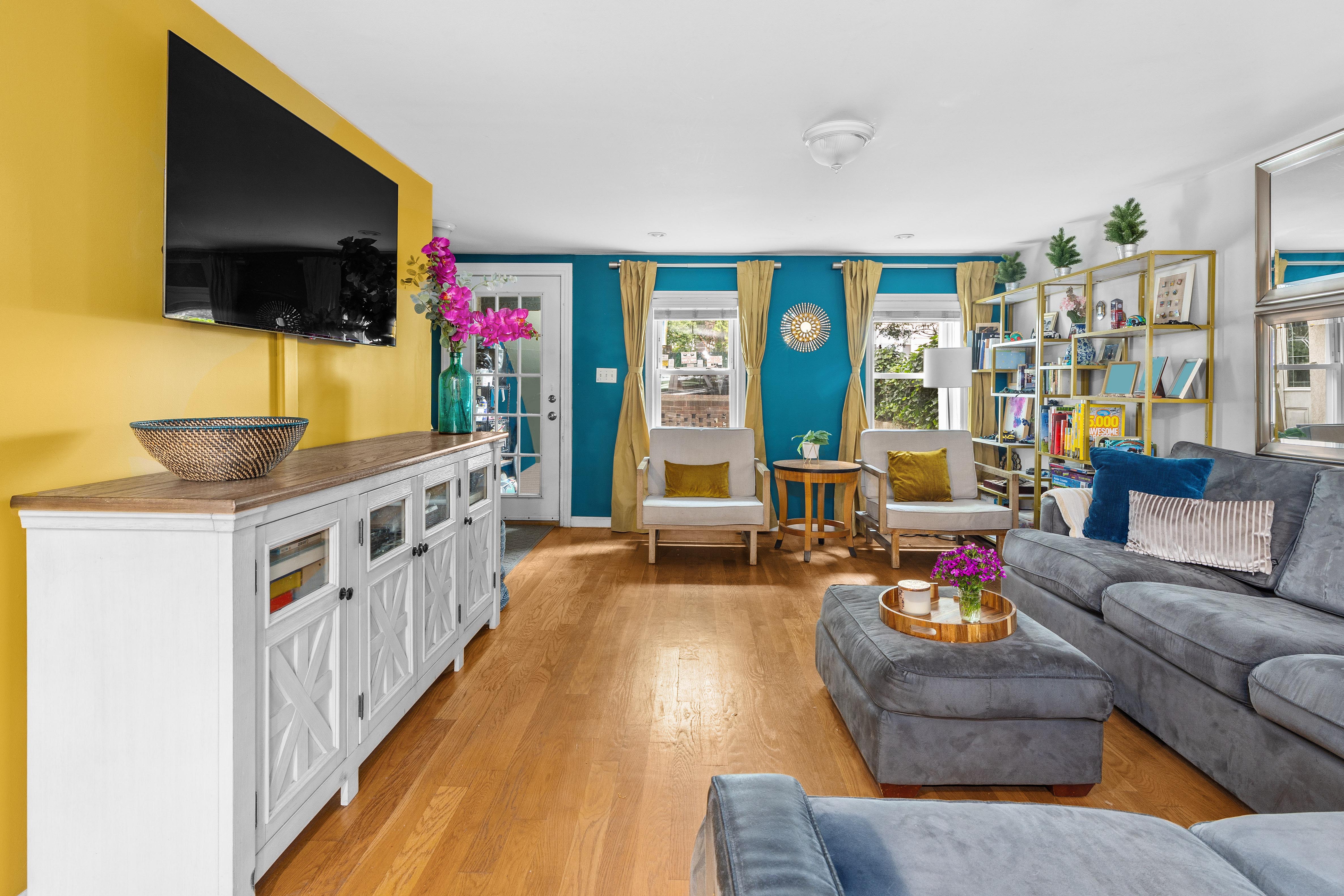 266 18th Street Brooklyn, NY 11215 - Photo 1 of 20 a living room with furniture and a flat screen tv