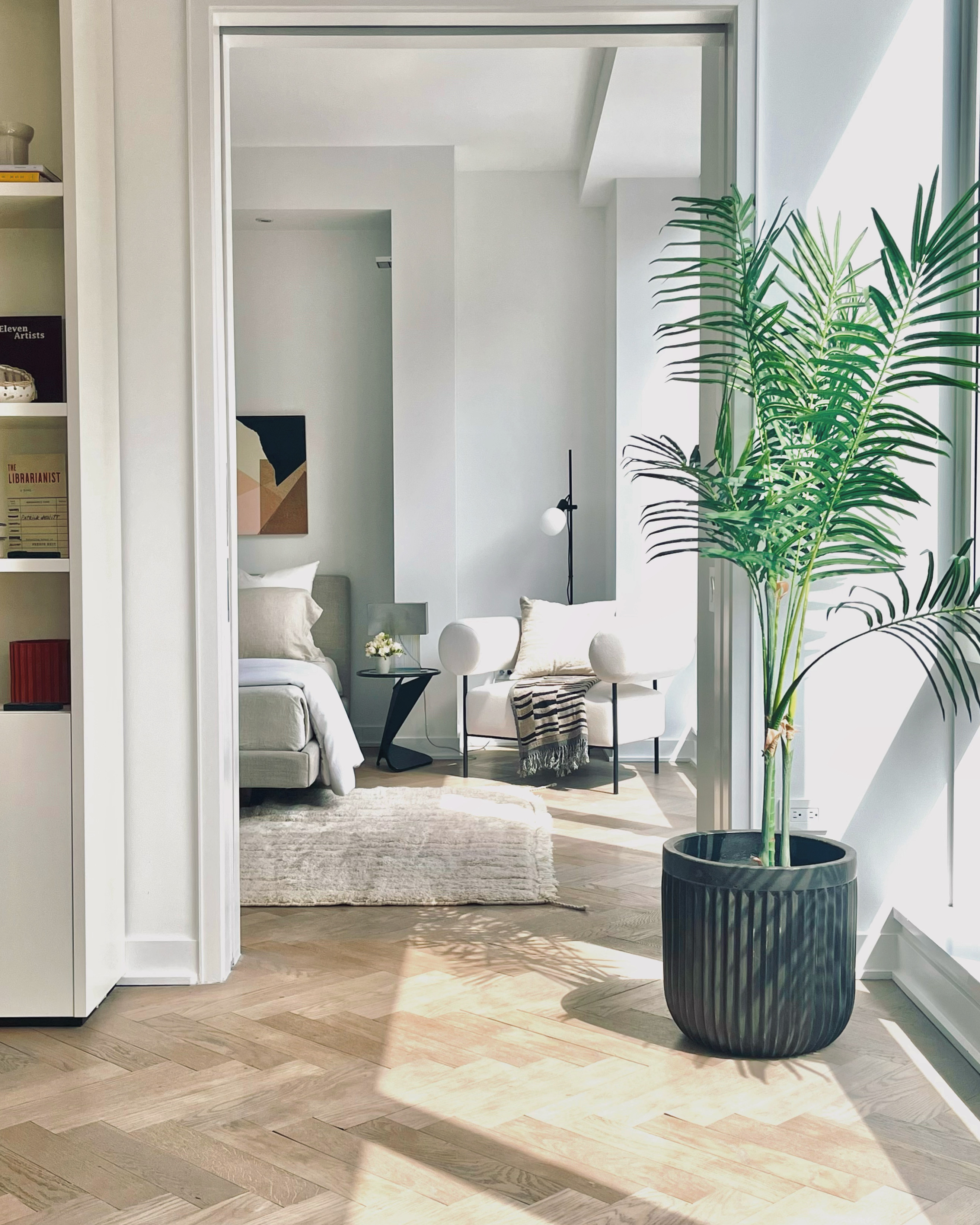 330 Spring Street, Unit 7D Manhattan, NY 10013 - Photo 6 of 11 a living room with furniture and a potted plant