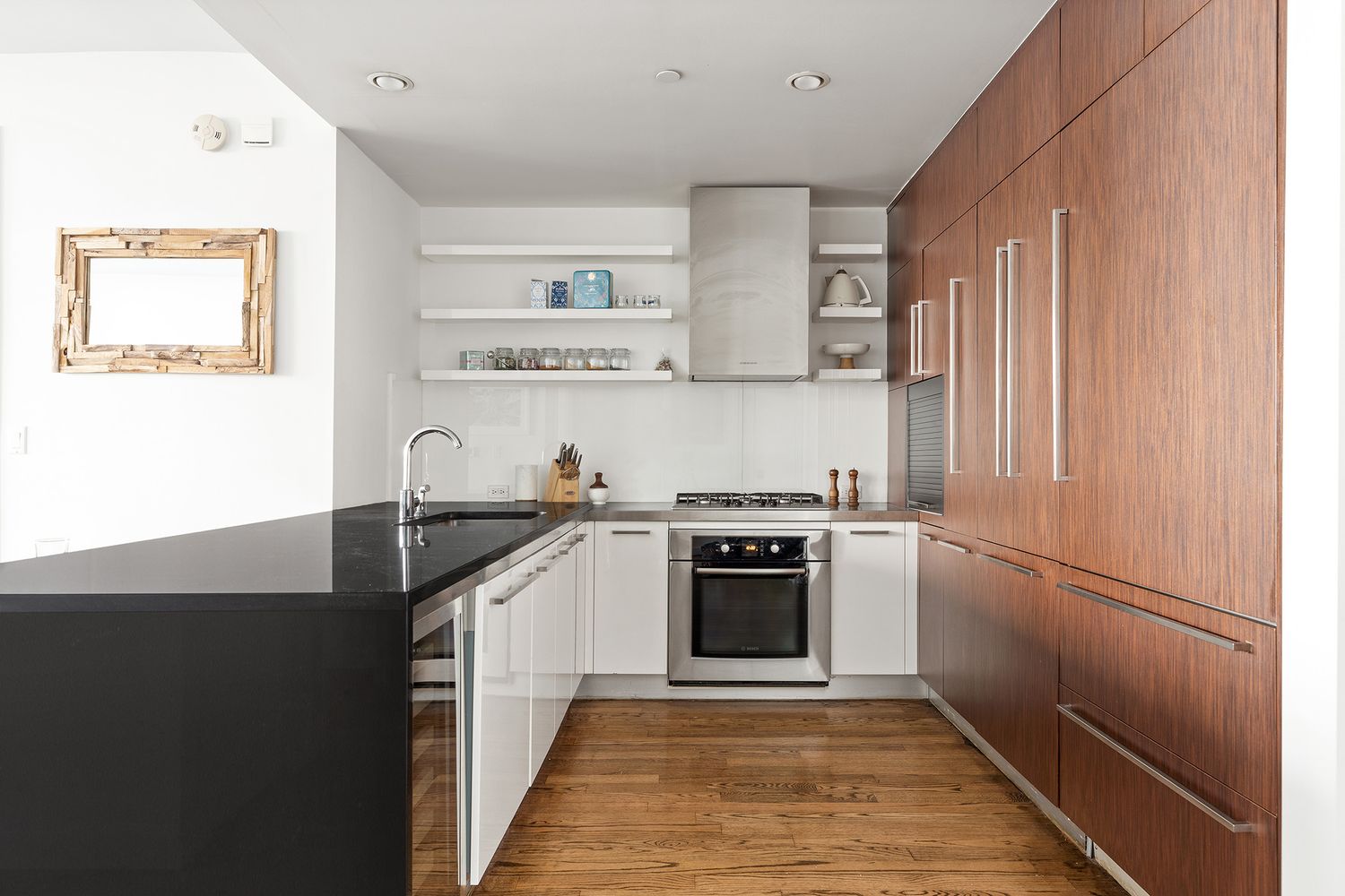 a kitchen with a sink stove and refrigerator