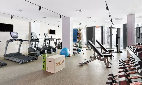 a view of a room with gym equipment