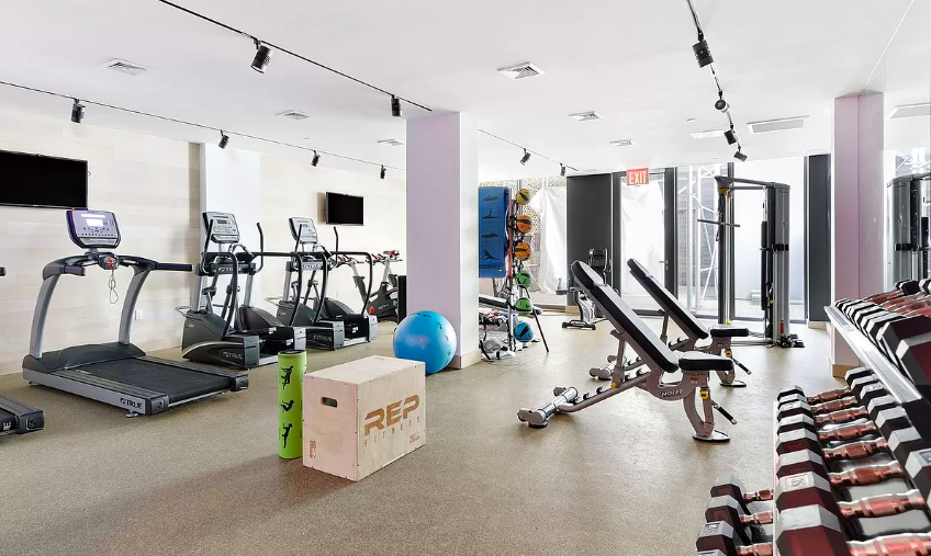 251 1st Street, Unit 7F Brooklyn, NY 11215 - Photo 19 of 24 a view of a room with gym equipment