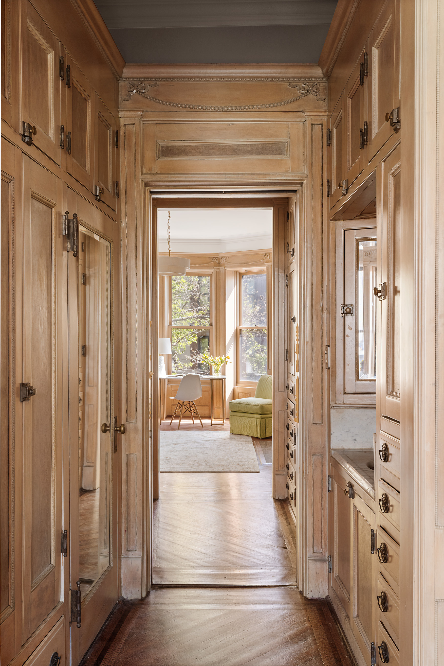 608 2nd Street Brooklyn, NY 11215 - Photo 24 of 34 a view of a hallway with a wooden door and a living room
