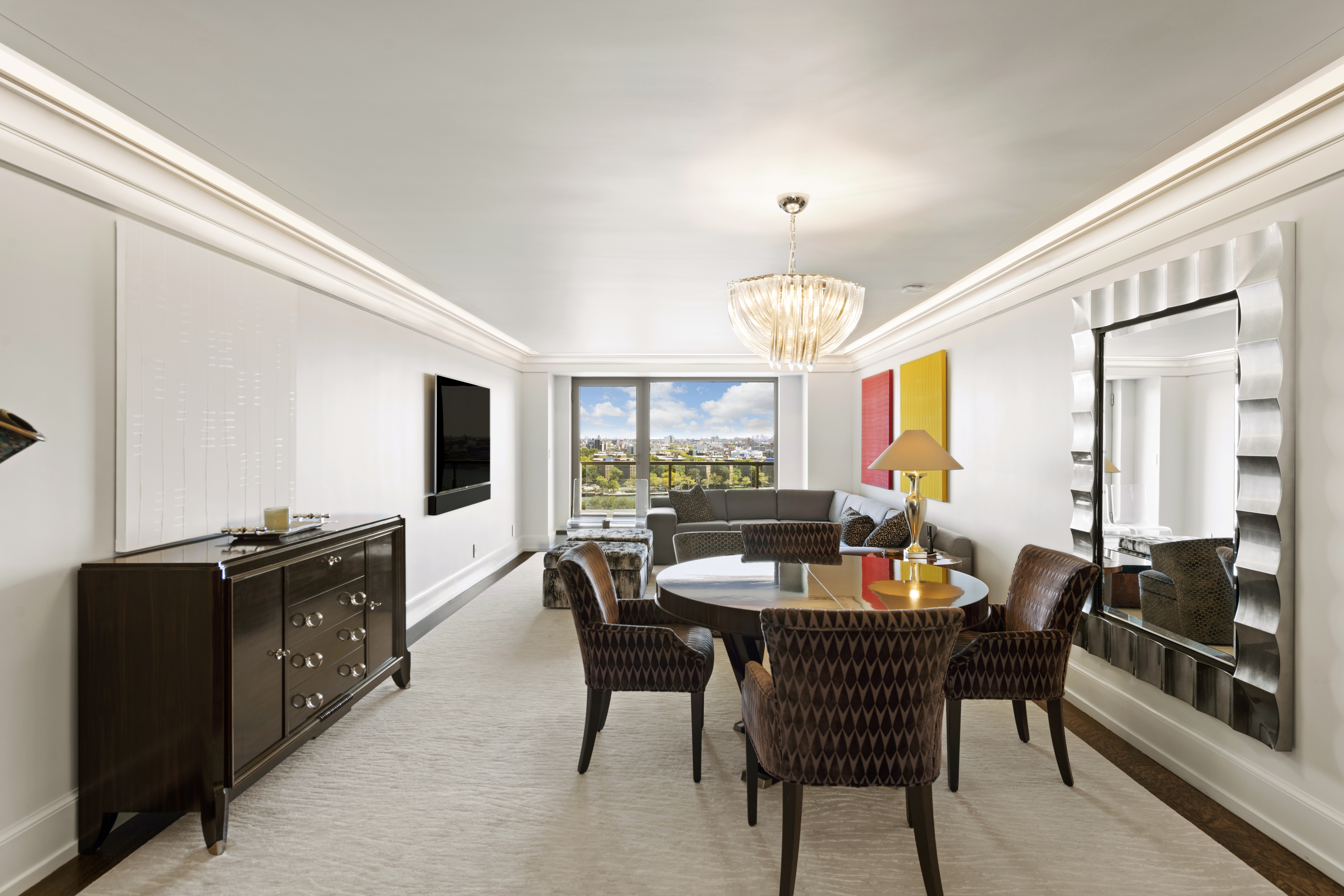 180 East End Avenue, Unit 15E Manhattan, NY 10128 - Photo 2 of 31 a view of a dining room with furniture and window