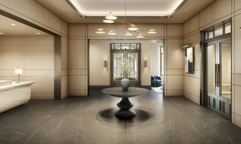 a bathroom with a bathtub shower sink vanity and toilet