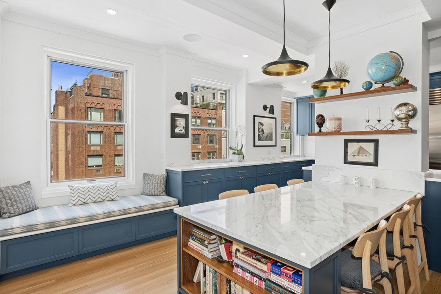 350 East 57th Street, Unit 14B Manhattan, NY 10022 - Photo 7 of 14 a living room with furniture and window