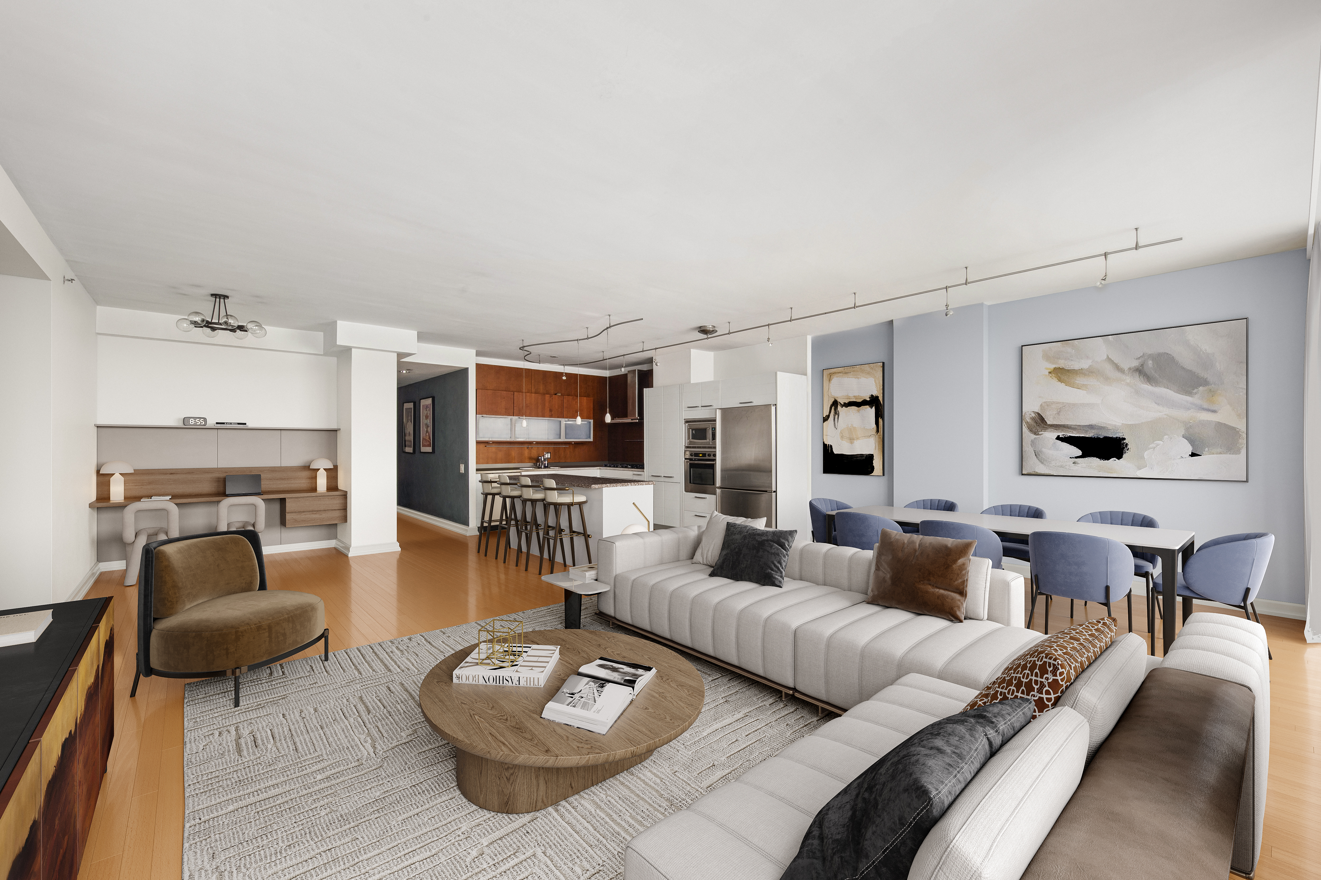 a living room with furniture and a wooden floor