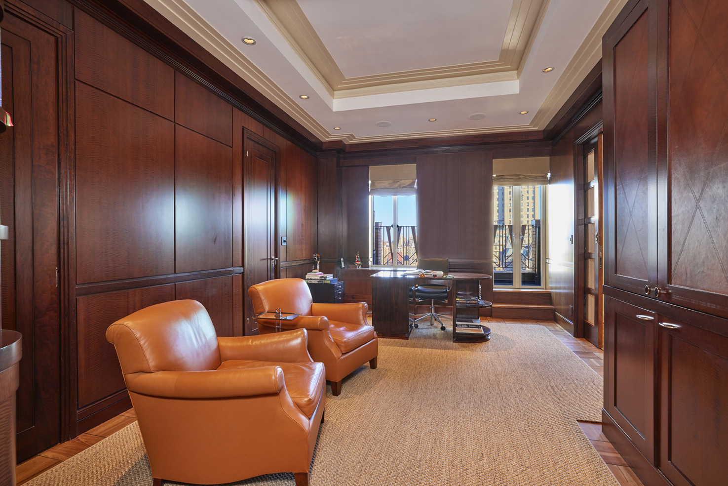115 Central Park West, Unit 18JK Manhattan, NY 10023 - Photo 5 of 25 a living room with furniture a lamp and large window