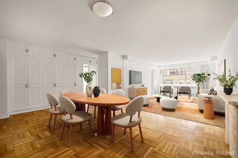 a view of a dining room with furniture