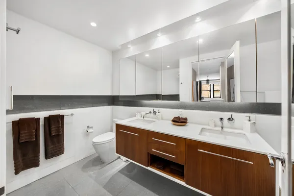 a utility room with sink dryer and washer