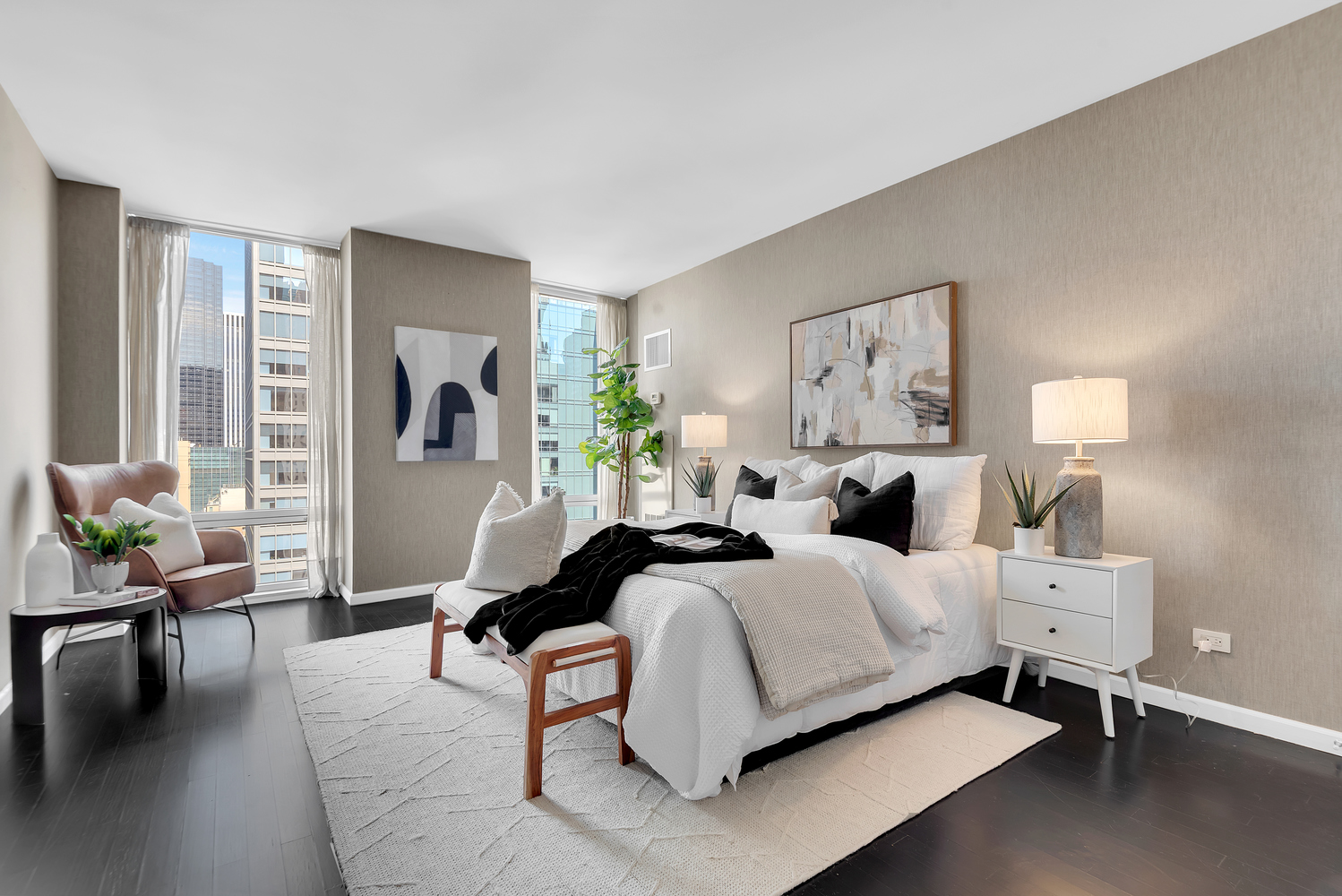 641 5th Avenue, Unit 26D Manhattan, NY 10022 - Photo 7 of 13 a bedroom with a bed and lamp