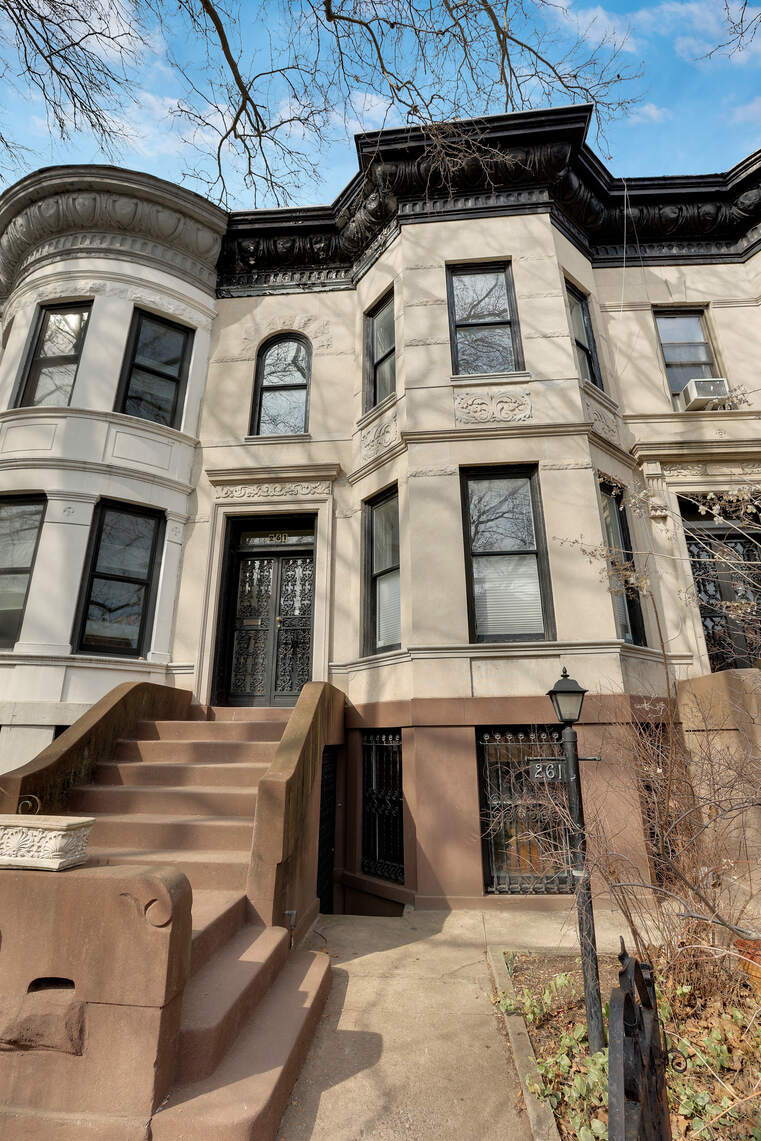 261 Fenimore Street Brooklyn, NY 11225 - Photo 3 of 21 a building with glass windows