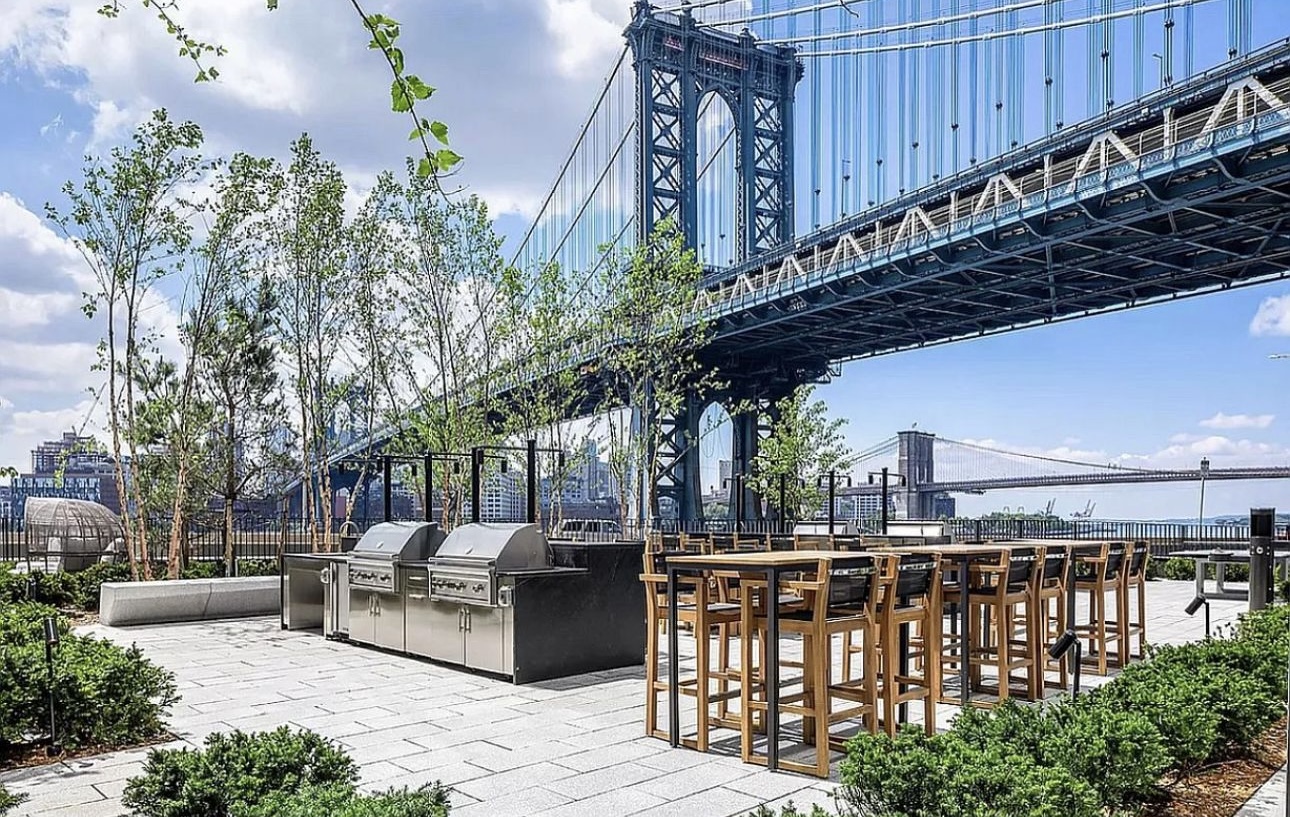 252 South Street, Unit 53B Manhattan, NY 10002 - Photo 14 of 24 a patio with glass top table and chairs