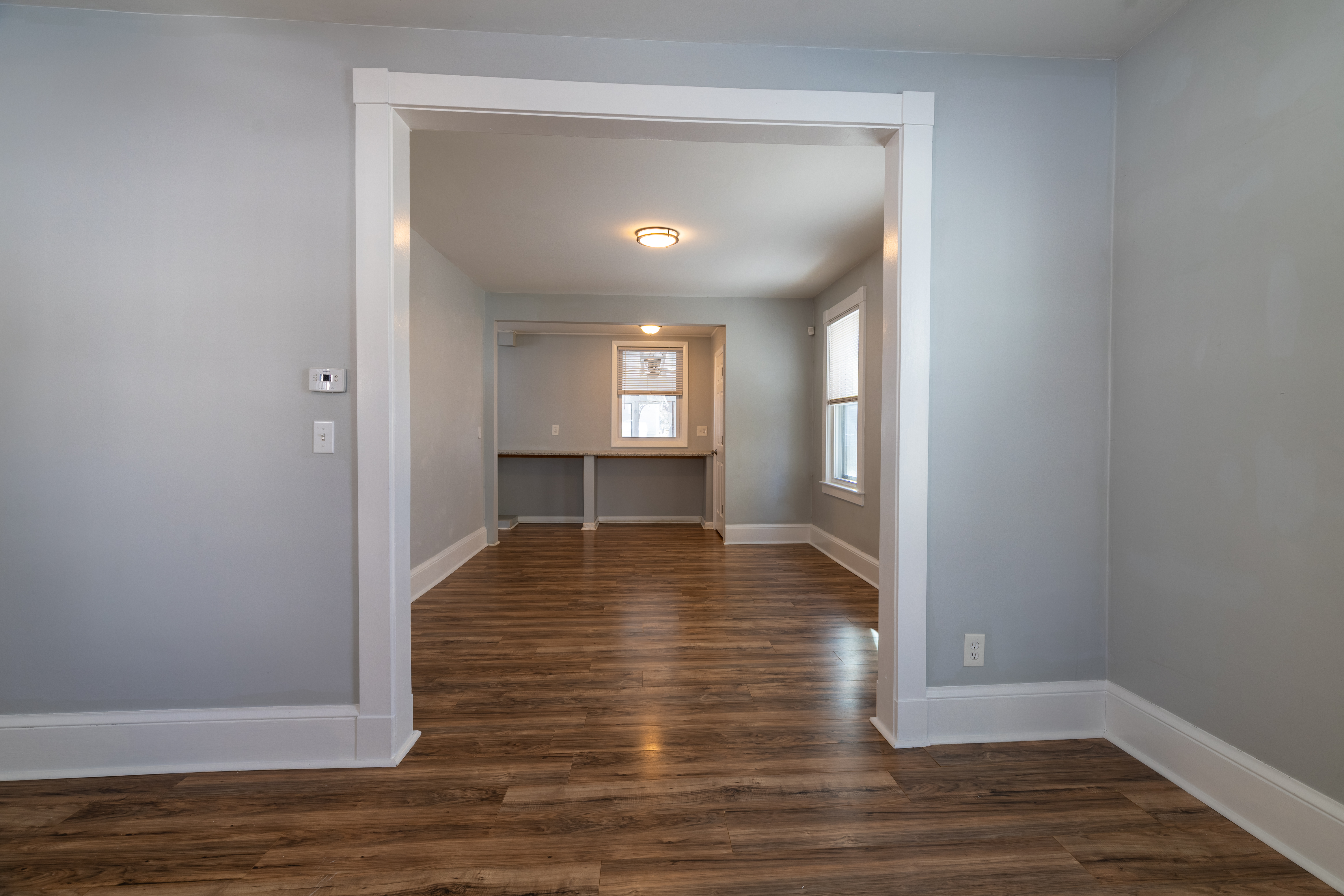 90 School Street New London, CT 06320 - Photo 6 of 34 a view of a hallway with wooden floor