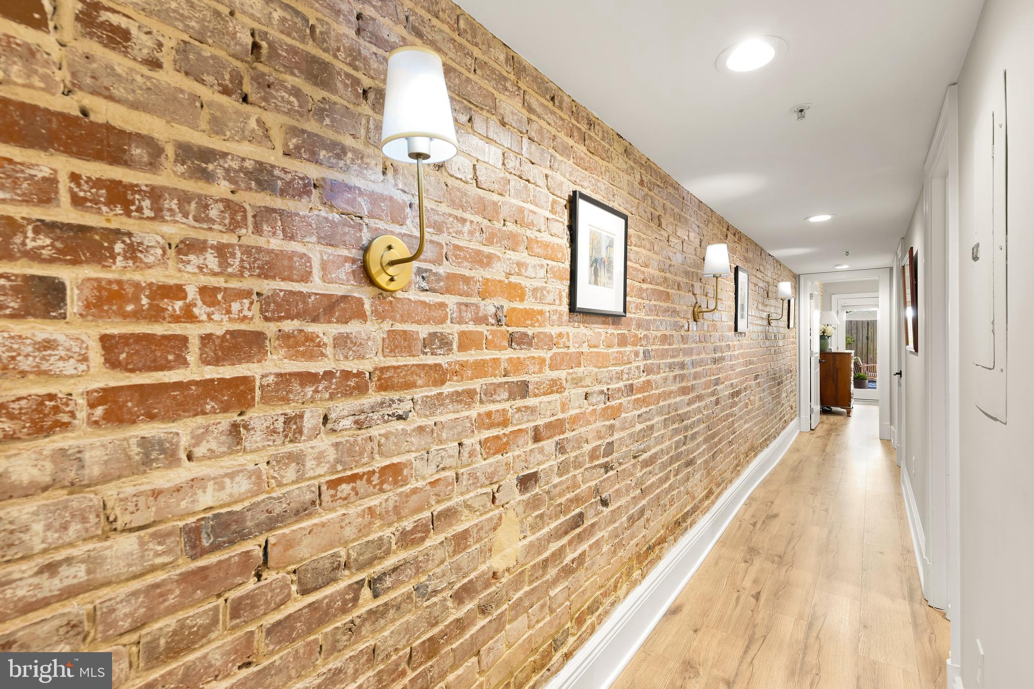 1354 Kenyon Street Northwest, Unit G Washington, DC 20010 - Photo 21 of 37 a hallway with a black white checkered floor