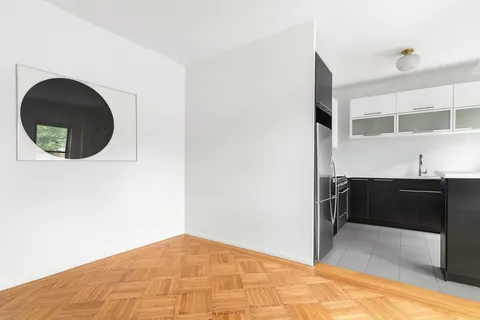 a bedroom with a bed and a cabinets