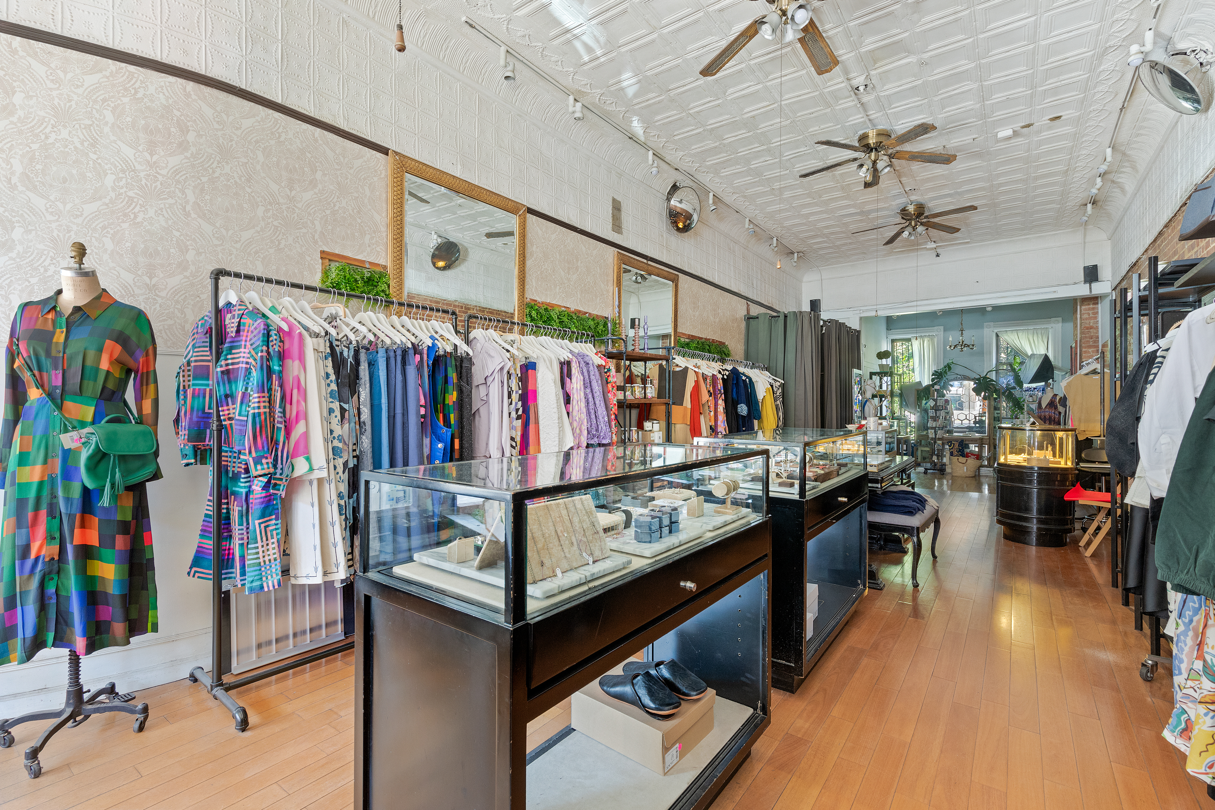 360 7th Avenue, Unit STORE Brooklyn, NY 11215 - Photo 1 of 8 a group of people sitting in a room