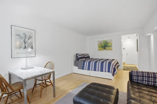 a bedroom with furniture and a couch