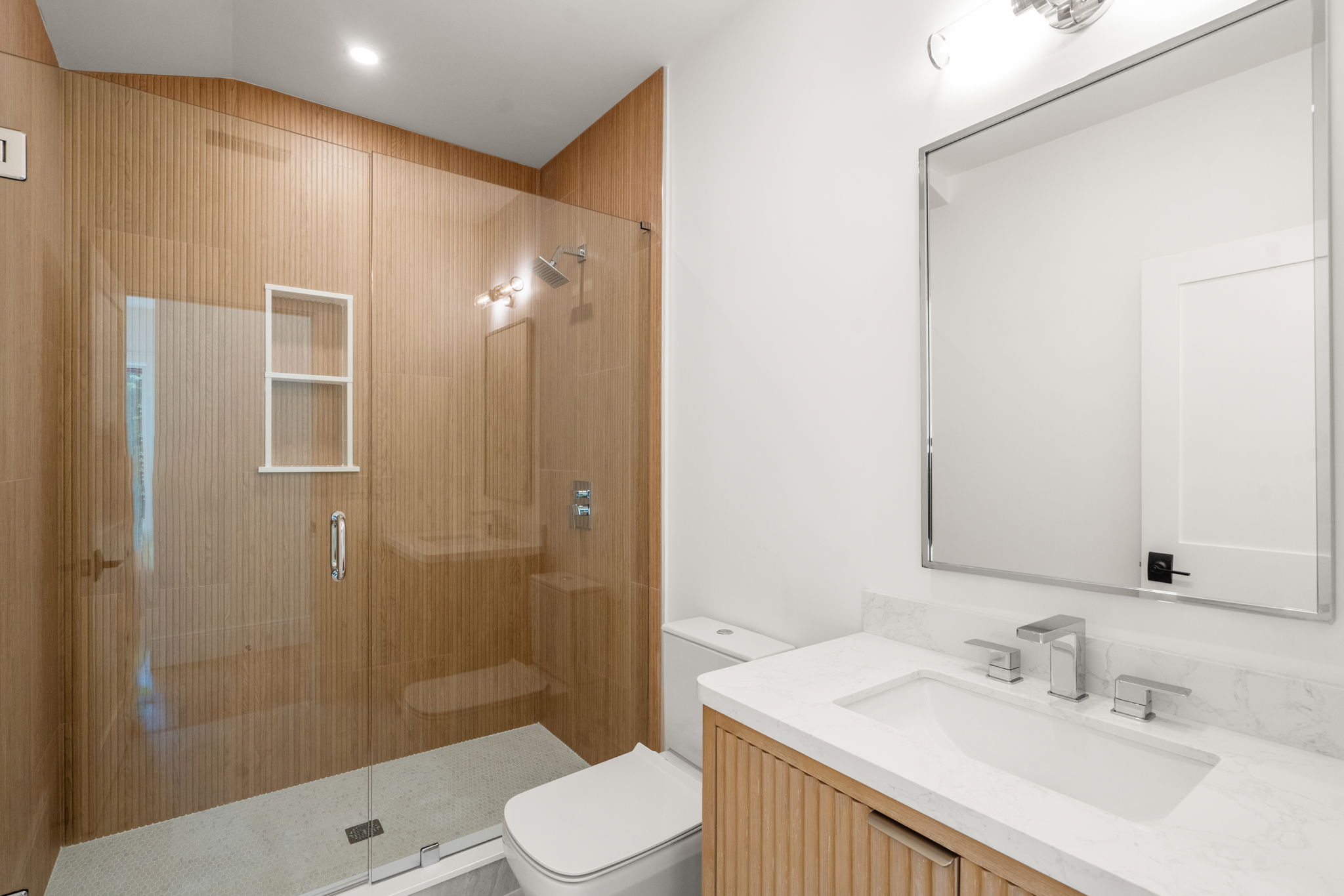 20 Oakland Street Wellesley, MA 02481 - Photo 24 of 30 a bathroom with a sink a toilet and shower