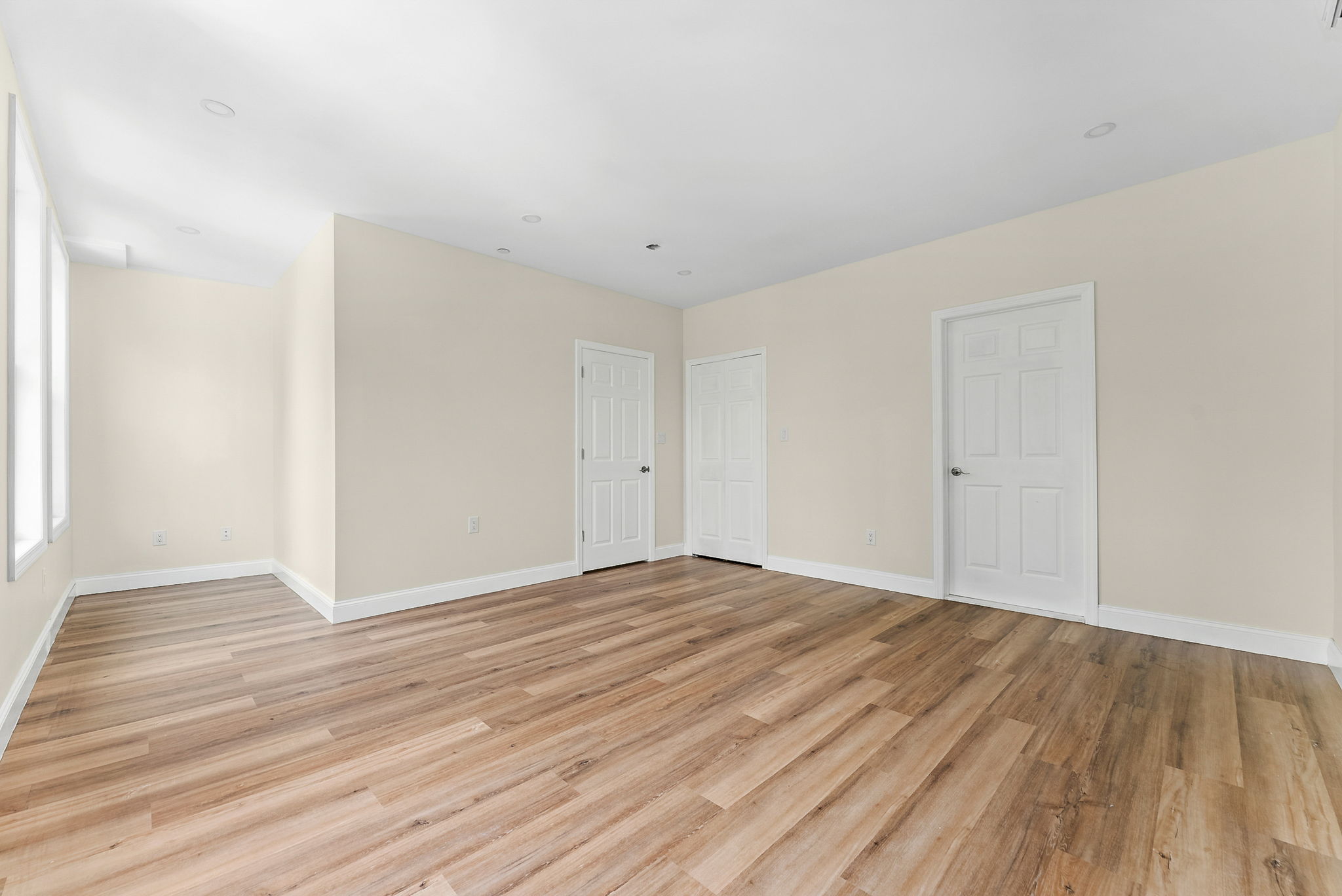 217 Butler Street, Unit 2 Brooklyn, NY 11217 - Photo 7 of 15 a view of an empty room with wooden floor