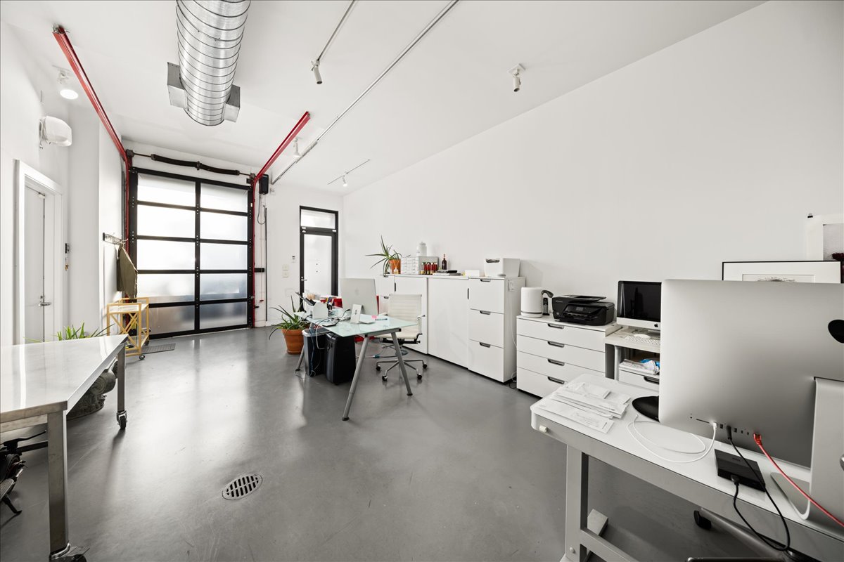 162 Beard Street Brooklyn, NY 11231 - Photo 13 of 20 a living room with furniture and large windows