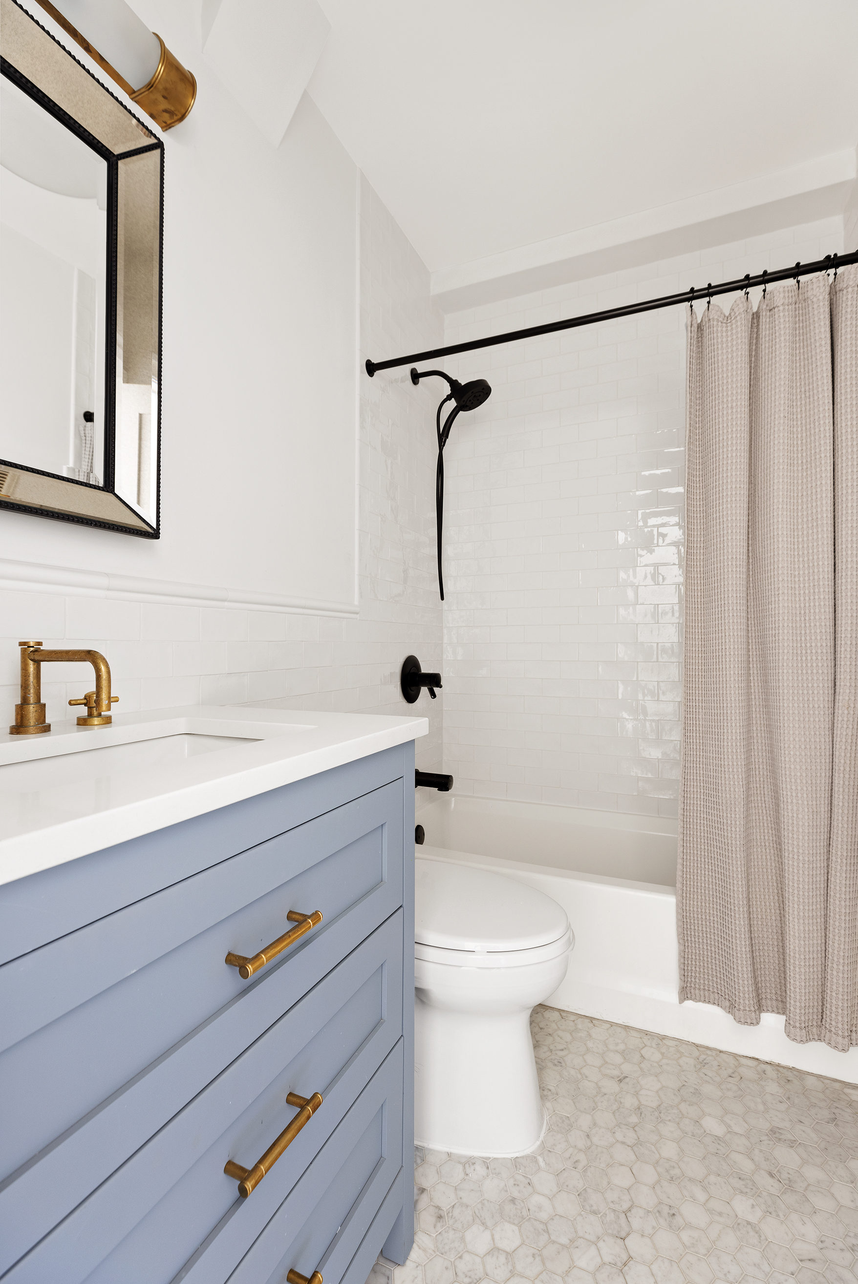 203 Halsey Street Brooklyn, NY 11216 - Photo 11 of 21 a bathroom with a shower a sink a toilet and mirror