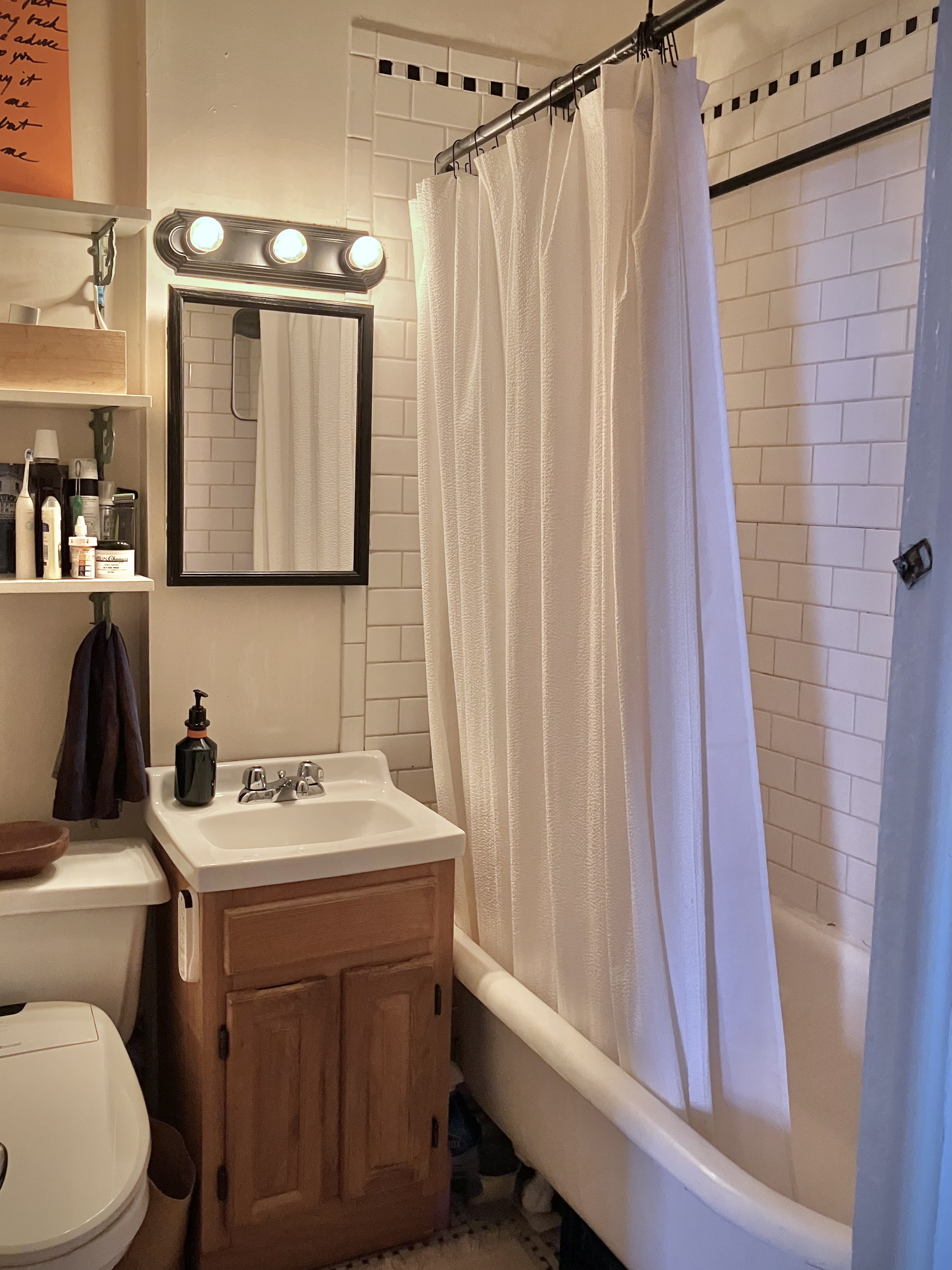 97 Bergen Street, Unit 6 Brooklyn, NY 11201 - Photo 6 of 7 a bathroom with a sink a toilet and a mirror