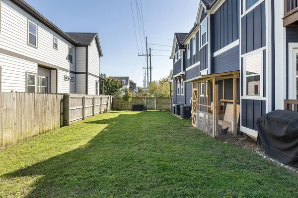 a balcony with furniture and a view of balcony
