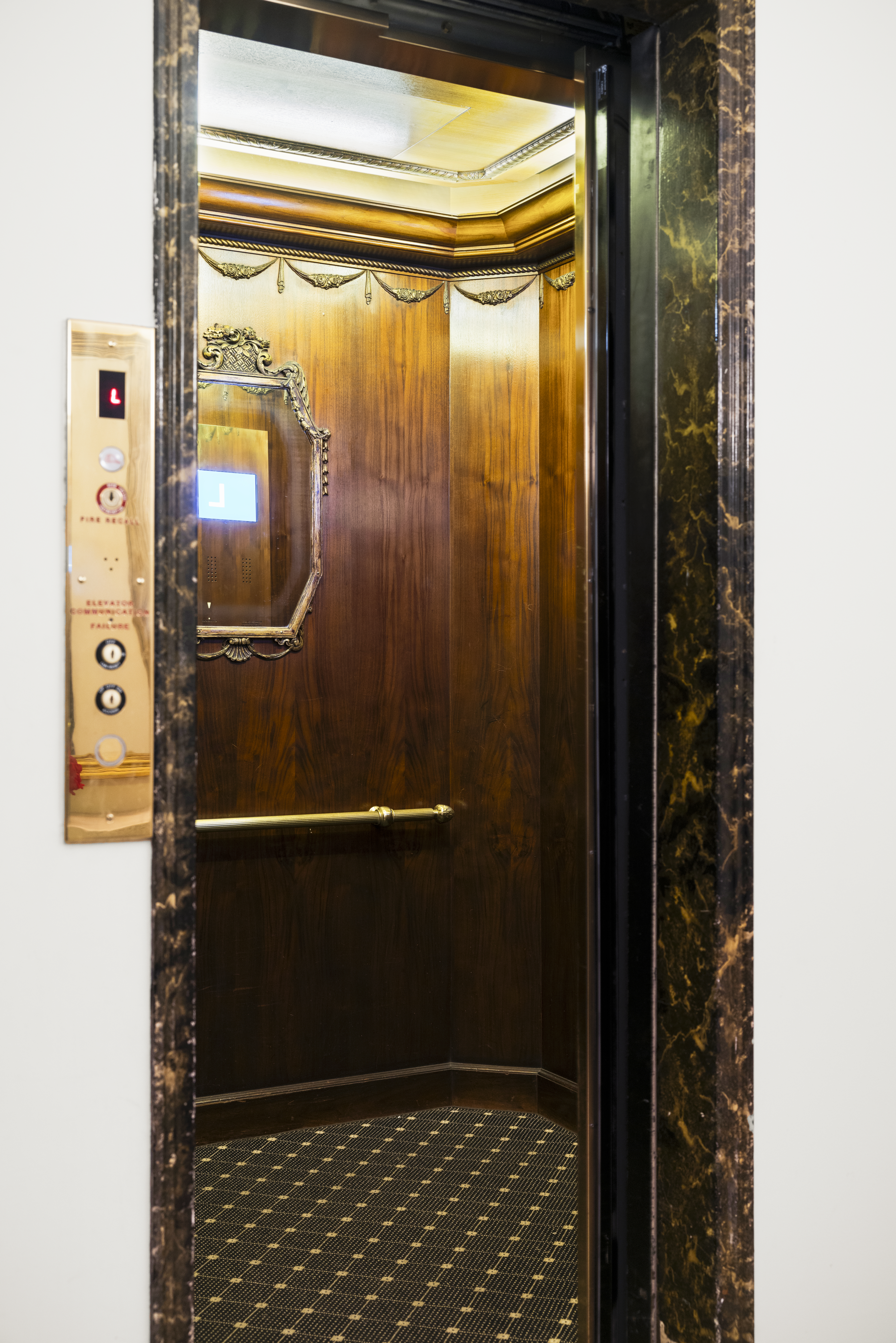 1158 5th Avenue, Unit 4A Manhattan, NY 10128 - Photo 20 of 24 a bathroom with a glass shower door