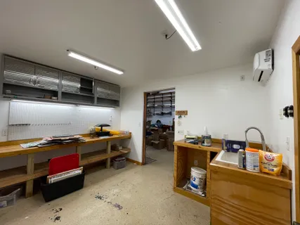 a room with gym equipment and a large window