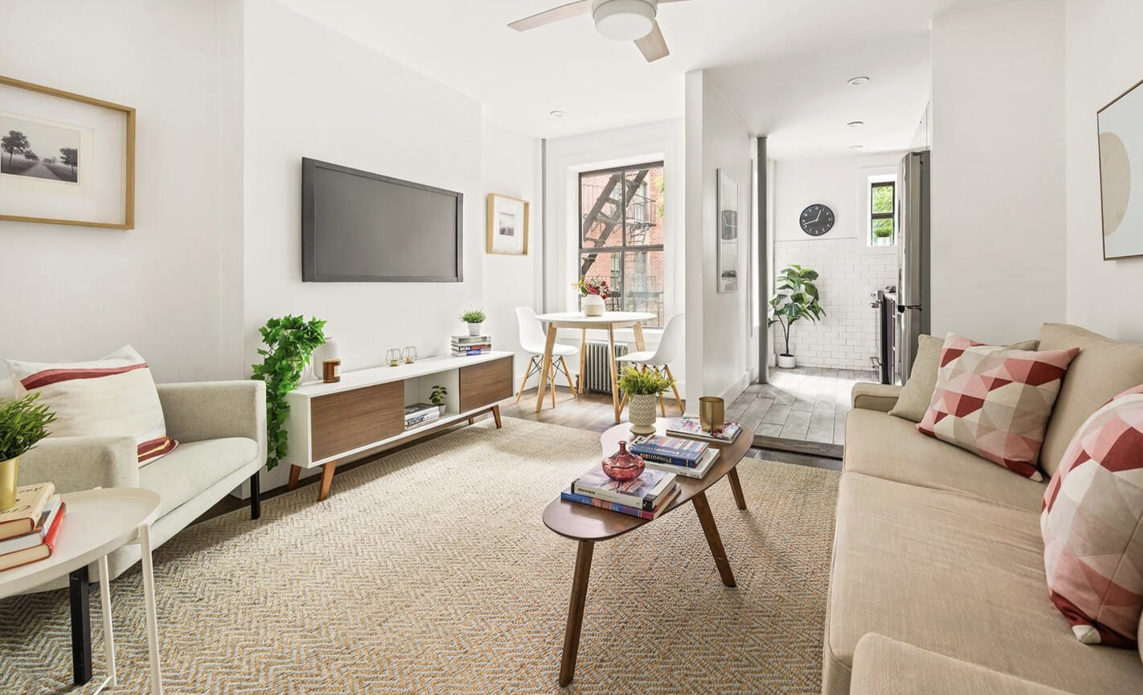 443 Hicks Street, Unit 2E Brooklyn, NY 11201 - Photo 2 of 12 a living room with furniture and a flat screen tv