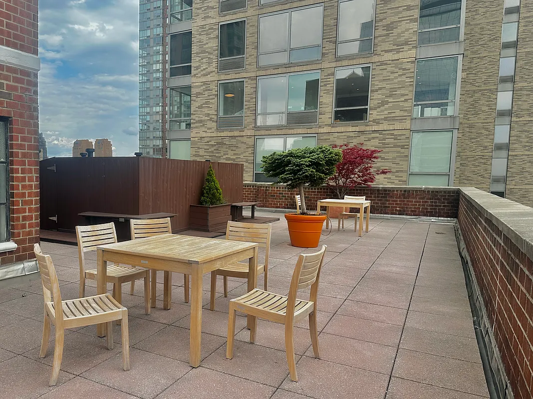 130 West 67th Street, Unit 2E Manhattan, NY 10023 - Photo 7 of 11 a view of a backyard with sitting area
