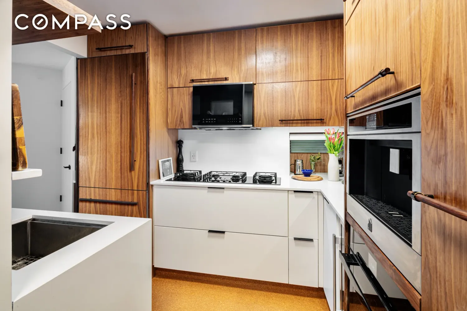 a kitchen with a stove and a microwave