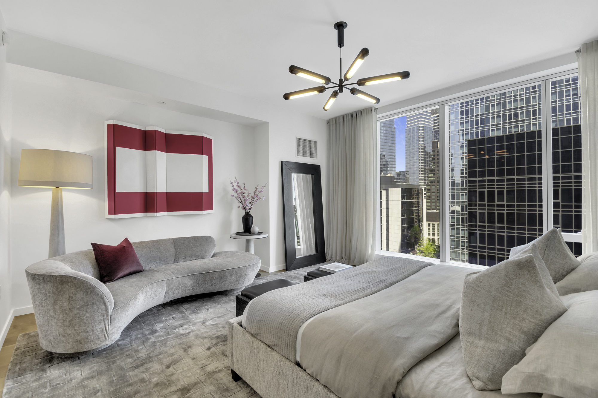 1 West End Avenue, Unit 10A Manhattan, NY 10023 - Photo 12 of 38 a spacious bedroom with a bed couch and window