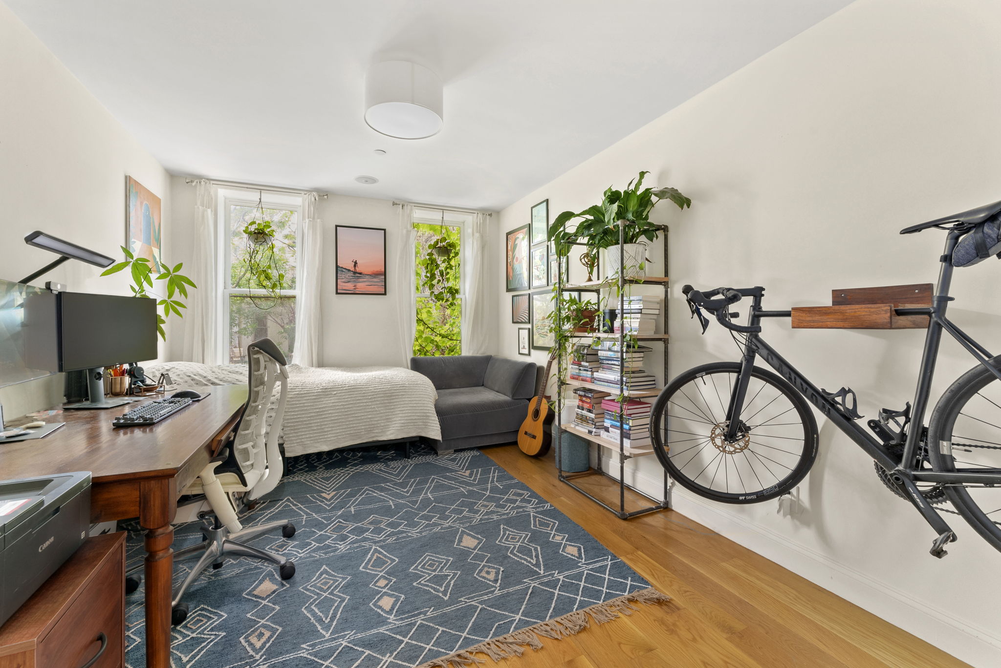 54 State Street, Unit 5 Brooklyn, NY 11201 - Photo 7 of 9 a bedroom with a bed and a table