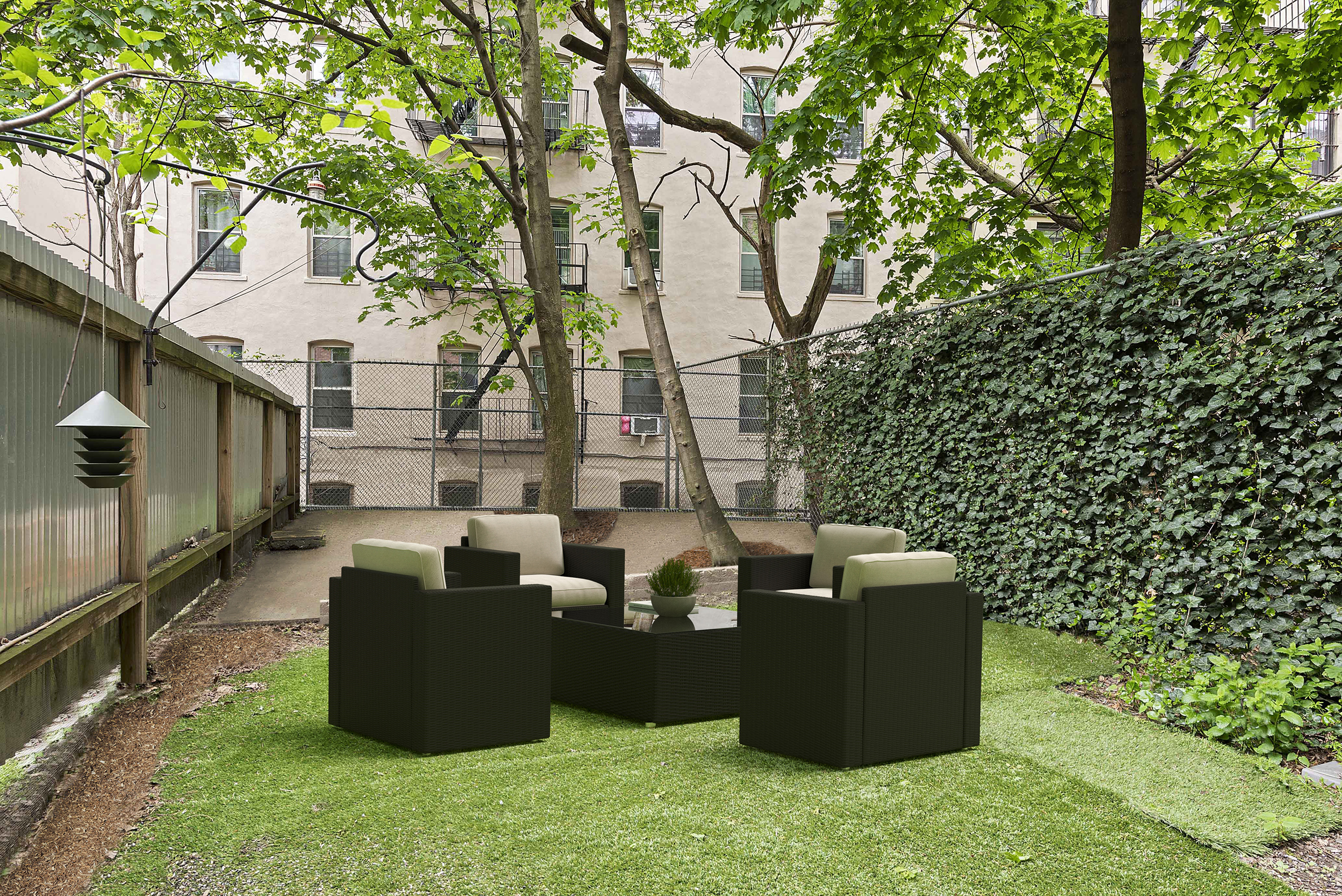 22 West 120th Street Manhattan, NY 10027 - Photo 19 of 21 a view of backyard of house with outdoor seating