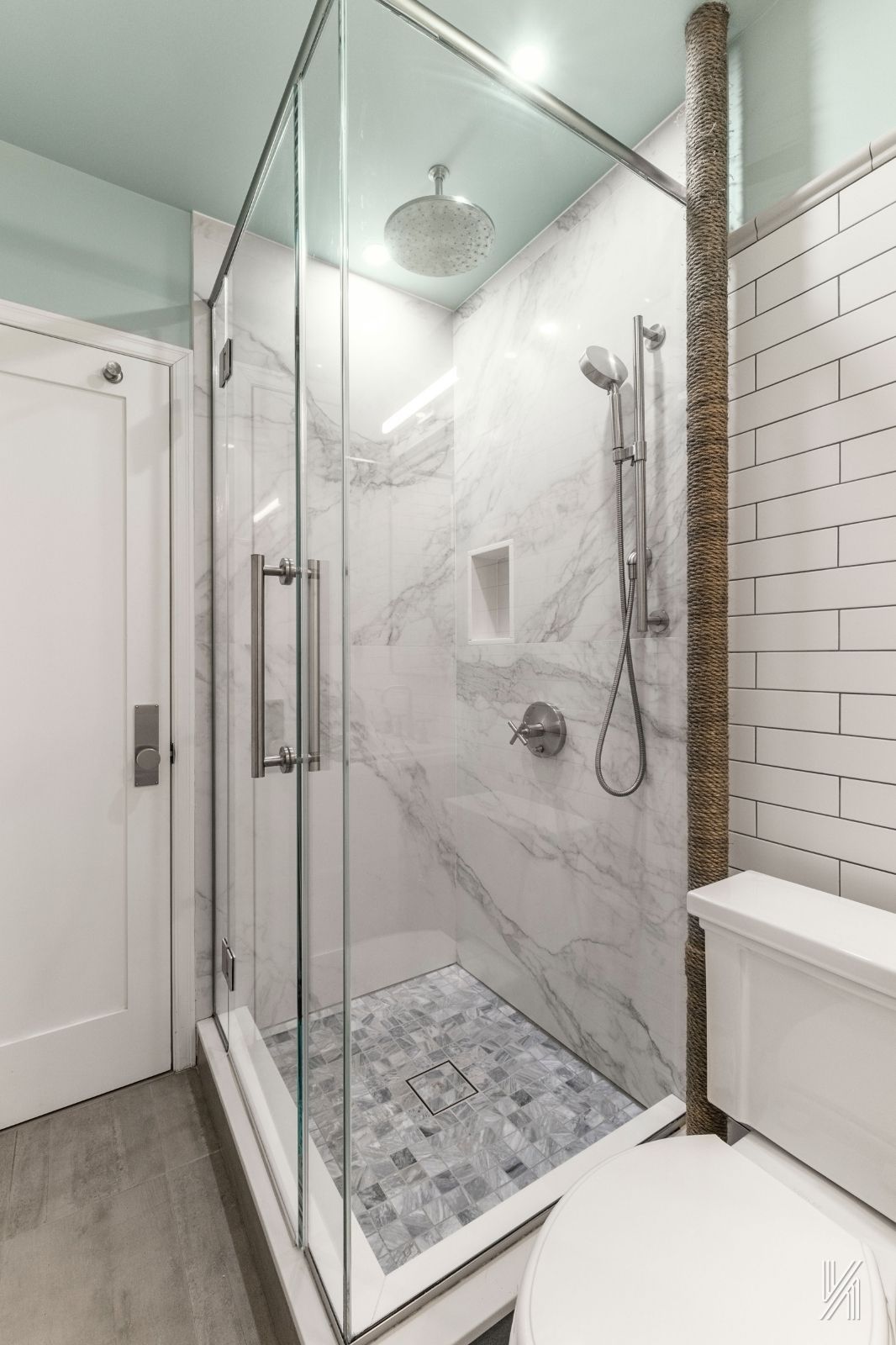 35-06 88th Street, Unit 3G Queens, NY 11372 - Photo 17 of 20 a bathroom with a shower and a sink