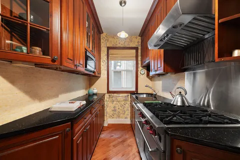 a view of a house with a street