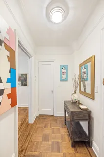 a bedroom with a bed and a cabinets