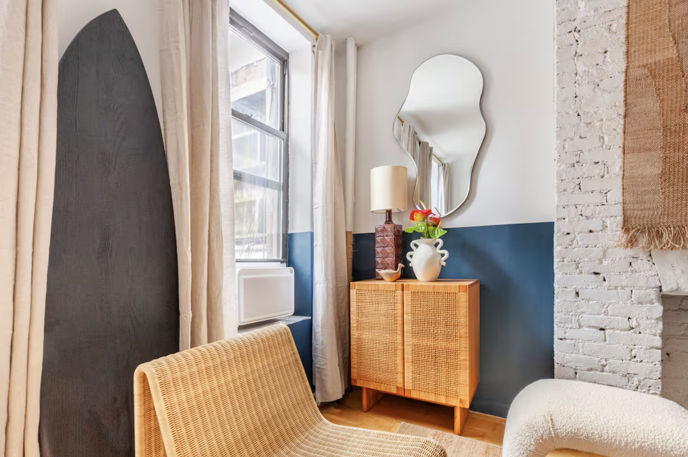 240 Mulberry Street, Unit 2 Manhattan, NY 10012 - Photo 5 of 19 a bedroom with bed and wooden floor