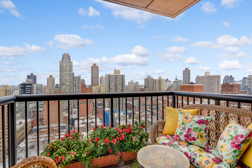 171 East 84th Street, Unit 22C Manhattan, NY 10028 - Photo 1 of 17 a view of a city from a balcony