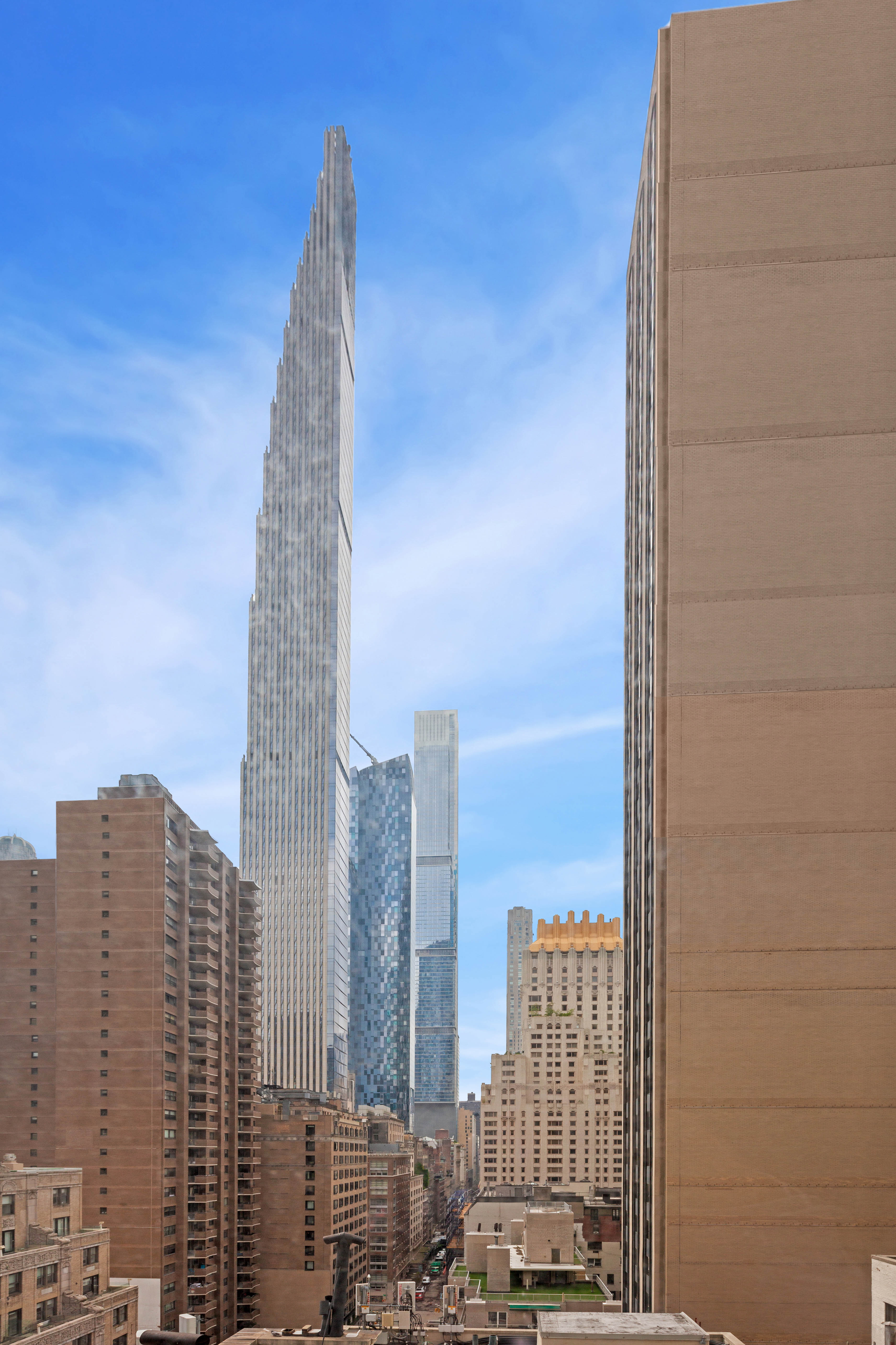 1 Central Park South, Unit 1241 Manhattan, NY 10019 - Photo 4 of 14 a view of a city with tall buildings