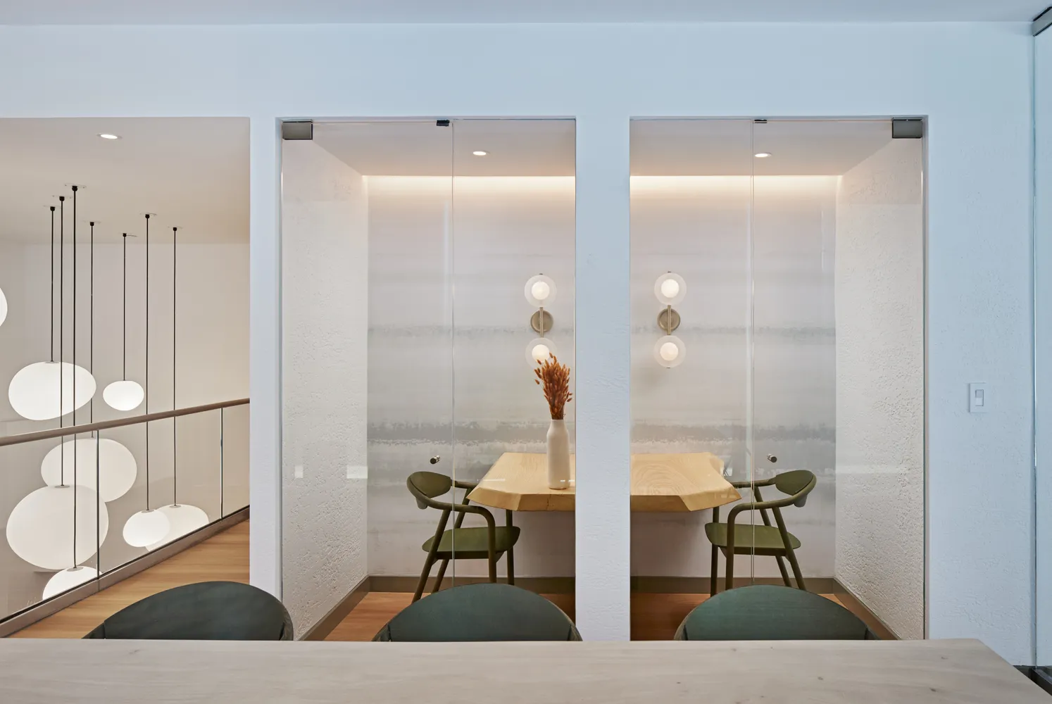 a room with chairs and table