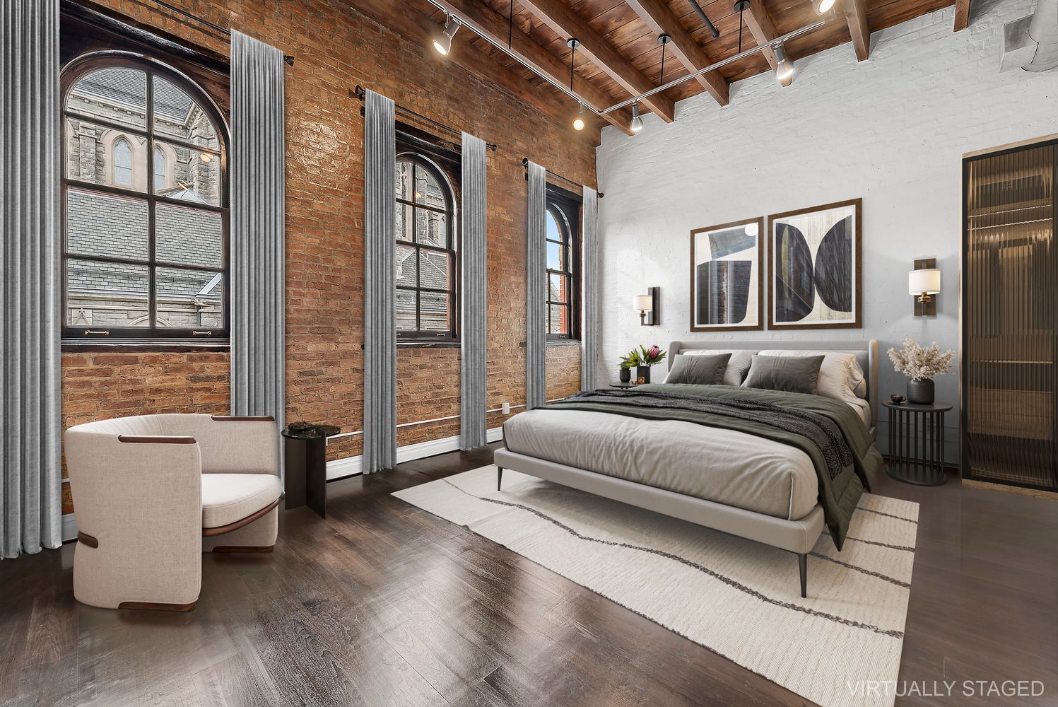 a bedroom with a bed and wooden floor